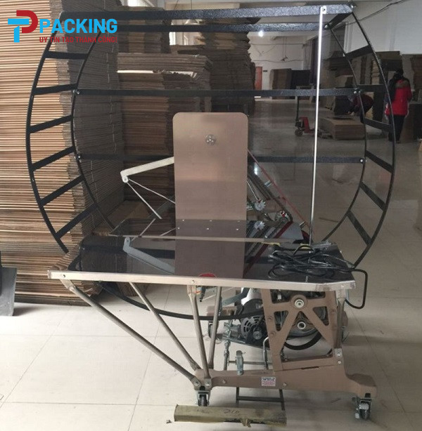 Máy buộc dây thùng carton