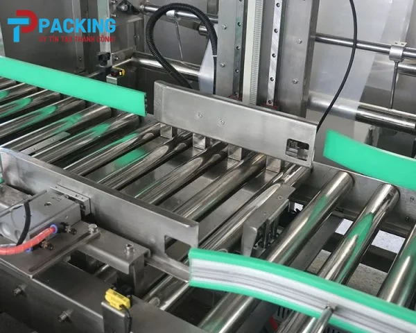 Máy lồng túi tự động Bag inserter