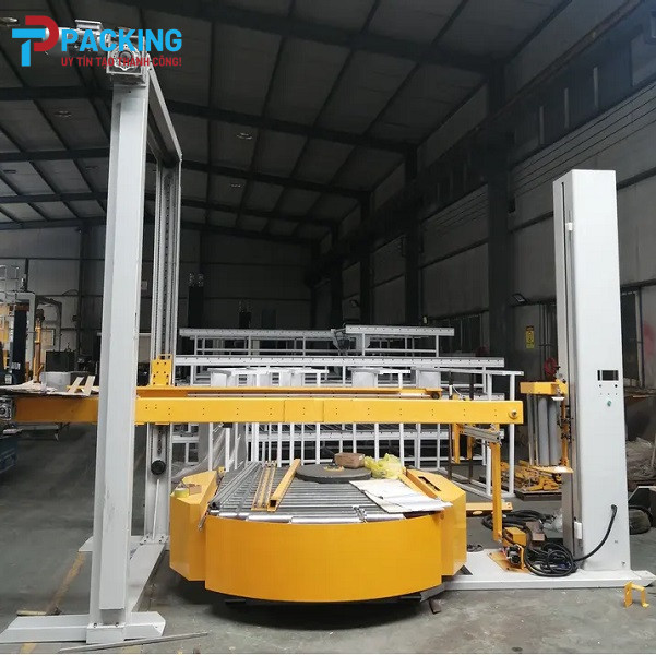 Máy quấn màng pallet tích hợp phủ tấm dinh