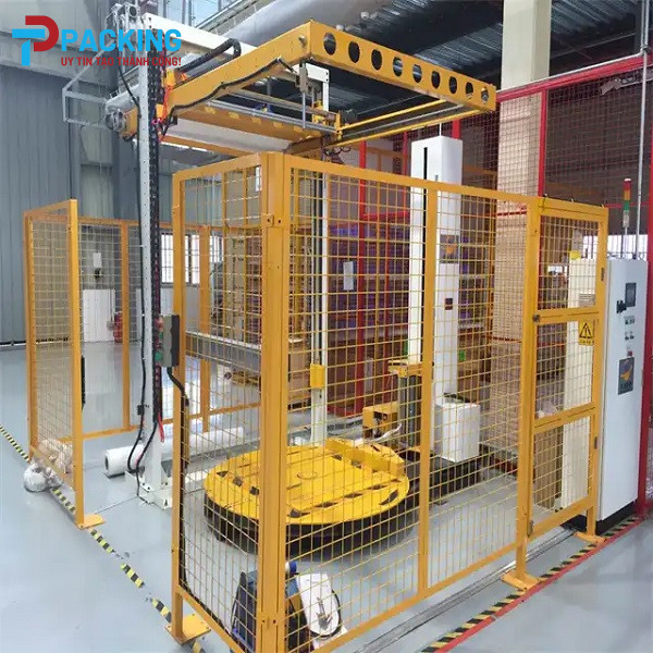 Máy quấn màng và phủ tấm nóc cho kiện hàng xuất khẩu
